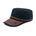 Close-up of black cotton flat top cap with brown leather brim and metal FS logo - Black