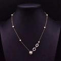 Long golden necklace with freshwater pearls and crystal rings on black mannequin - S925 Silver Crystal Bowknot Pearl Chain