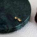 Polished gold DIY alphabet R pendant with metal bead loop on dark marble base - Letter Pendant (R) / Gold