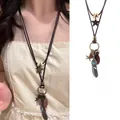 Detail of adjustable bohemian wax rope necklace with metal star and feather charms - Bohemian Star Feather Style (10#)