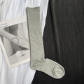 Detailed view of grey ribbed knit knee-high socks showing fine texture and weave detail - Calf-length Light Grey
