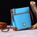 Detail of light blue and brown lychee textured leather crossbody bag with metal zipper - Light Blue
