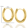 Détail de boucles d'oreilles dorées en U avec finition polie et dimensions - Boucles d'Oreilles Huggie Ovales Dorées