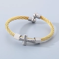 Twisted steel cable cuff bracelet in gold finish with silver cross and ball accents - Gold (KB149477-KLHQ)