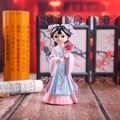 Detailed close-up of an ancient Chinese style girl figurine with floral fan and traditional dress - Medium Size Holding Fan
