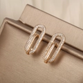 Golden paperclip earrings with micro-pave white zircon inlay for a luxury look - Paperclip Pave / Gold