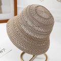 Close-up detail of beige hollow-out knitted bucket hat featuring intricate mesh pattern - One Size / Apricot
