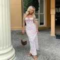 Detail of slim-fit white floral maxi dress with red tie neckline and cherry print - S / White