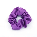 Lustrous purple satin scrunchie with silk-like texture for elegant hair styling - Purple