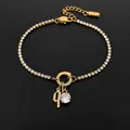 Elegant 14K gold plated titanium steel tennis bracelet with Gothic letter Q and crystal pendant - Letter Q