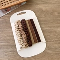Detail of 6pcs brown earth tone scrunchies set on paper card atop wood surface - Scrunchie And Hair Ring Set / Brown Set