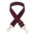 Close-up of burgundy geometric pattern bag strap with gold metal hooks and buckle - Silver Clasp / Dark Wine Red