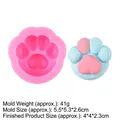 Rosa Silikonform in Katzenpfoten-Optik für DIY mit blauem und rosa Harz-Musterstück - Kleine Katzenpfote / Rosa