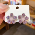 Silver flower stud earrings with purple zircons and pink center gem on display card - Silver Needle Purple Flower