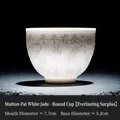 White suet jade ceramic tea cup with relief lotus koi fish and heart sutra details - Round Cup [Abundance - Relief]