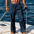 Men's navy cotton linen casual trousers with elastic drawstring waist on a yacht deck - Navy Blue
