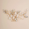 Detailed close-up of handmade bridal hair comb with gold wire, pearls and crystals - Gold