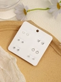 Flat lay of 6 pairs of silver earrings with heart and star shapes on a weekly display card - Silver Butterfly Heart Pearl (FX885-6)