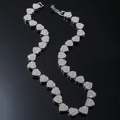 Silver iced-out heart Cuban link necklace with sparkling crystals on black background - 20 inch / Silver