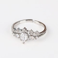 Detail of silver adjustable ring featuring a pear-cut zircon and leaf-shaped metal accents - Clear Pear Leaves White Gold Style (Style 10 White Gold)