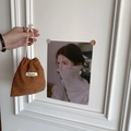 Brown corduroy drawstring cosmetic pouch with white fabric label and cotton rope closure - Brown