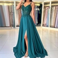 Elegant emerald green lace evening dress with sequins and high slit for formal events - S (US 2) / Malachite green