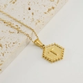 Golden titanium steel necklace with hexagonal pendant featuring embossed letter T - Letter T (Single Pendant)