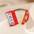Artistic accordion lapel pin in red and gold enamel, vintage musical instrument brooch - Accordion
