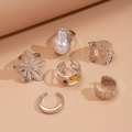 Sechsteiliges silbernes Ring-Set mit Perlen und bunten Steinen auf rosa Grund - Silber (6er-Set)