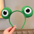 Cute green plush frog eye headband for girls, soft fabric hair accessory for washing face - Big Eyed Frog
