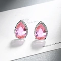Elegant teardrop pink zircon stud earrings with silver plating on display card - Pink Zirconia