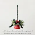 Christmas bell ornament with red metal base, pine cones, berries and green ribbon tie - Letter Green Ribbon Bell