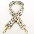 Detail of green and beige geometric woven strap with adjustable gold metal hardware - Army Green