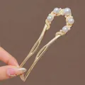 Elegant gold U-shaped hair fork with white pearls and delicate small bead accents - Pearl Dragon Coil