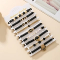 8-piece set of black and gold clay bead bracelets with American football themed charms - SY0765-1 Black Gold 10pcs Set