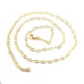 Detailed close-up of golden ball chain necklace with lobster clasp and extension - Loop Chain