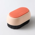 Coral orange and pink multi-purpose cleaning brush with dense grey soft bristles - Laundry Brush / Pink