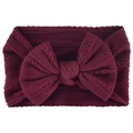 Burgundy ribbed nylon baby headband with a soft oversized bow detail for infants - Burgundy