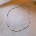 Elegant necklace with colorful beads, white pearls, and silver-tone clasp on silk background - Silver-Pink Beaded (84#)
