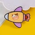 Cute yellow cartoon rocket enamel pin featuring a cow character for bags and clothes - 16 Cow Rocket