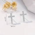 Detailed size view of silver cross stud earrings with cubic zirconia, 11mm by 7mm - EH761 Cross Zirconia Studs