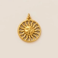 Macro shot of gold sun face pendant with hollow rays in polished 18K stainless steel finish - Sun 15mm