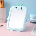 Foldable light blue cartoon vanity mirror with a green sprout design for desktop use - Grass Doll / Blue
