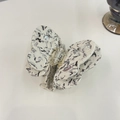 Detail of butterfly hair claw with white ink marble pattern and pink gemstone inlay - Gemstone White Black Ink Butterfly