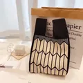 Knitted tote bag featuring black and white arrow patterns with thick woven texture - Champagne