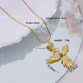 18K gold phoenix pendant necklace with green teardrop crystal and sleek snake chain - Gold Large Wings with Green Zirconia