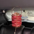 Close-up of red rhinestone dinner bucket bag with champagne satin drawstring and gold ring handle - Red