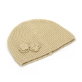 Close-up of beige knit beanie showing ribbed texture and crochet flower decorations - One Size / Off White