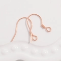 Macro shot of rose gold plated 925 sterling silver fish hook earrings DIY components - Rose Gold