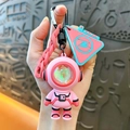 Cute pink astronaut keychain with holographic visor and pink braided strap charm. - Astronaut Atmosphere Light Pendant / Pink